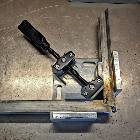 Dual-axis welding clamp